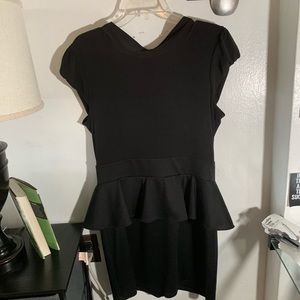 Peplum dress...90% polyester 10% spandex/stretchy